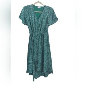 Green midi dress with white polka dots